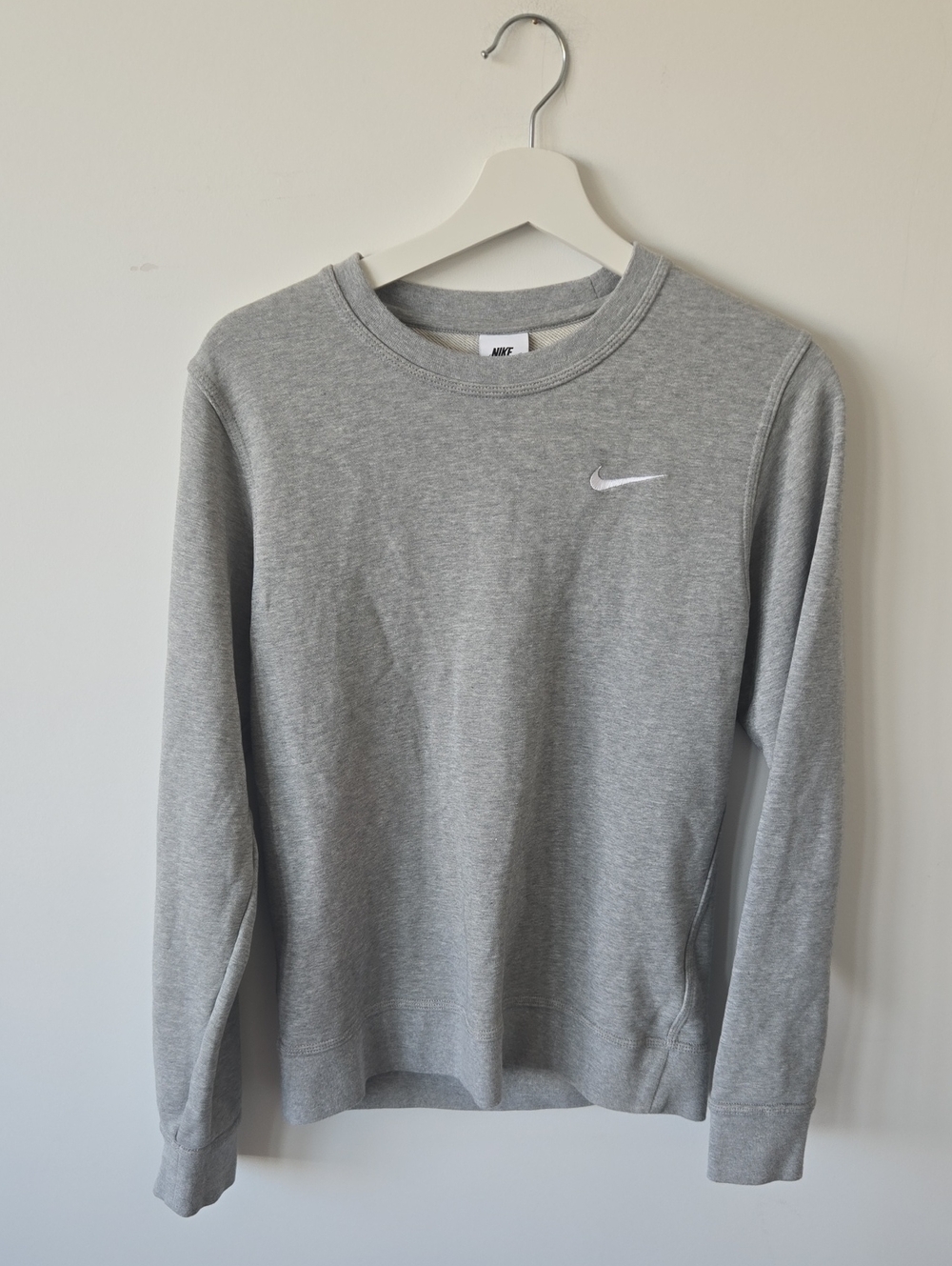 Nike Light Gray Sweatshirt with White Tag and Black Swoosh